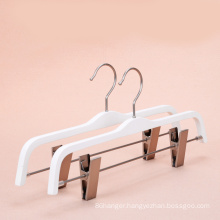 white wood laminated wood hanger with clips